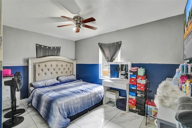 bedroom featuring ceiling fan