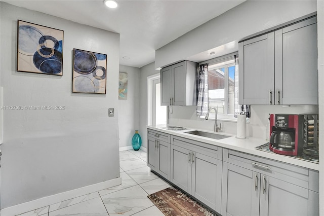 kitchen with sink and gray cabinets