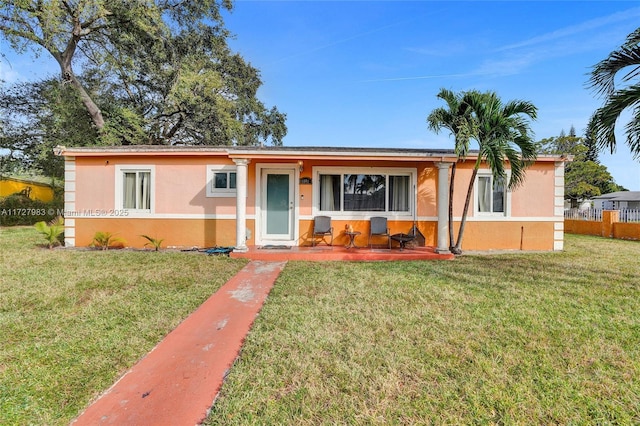 view of front of house with a front lawn