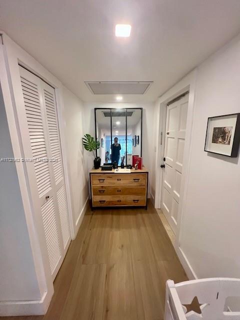 hallway featuring light wood-type flooring