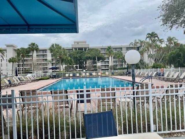 view of swimming pool featuring a patio