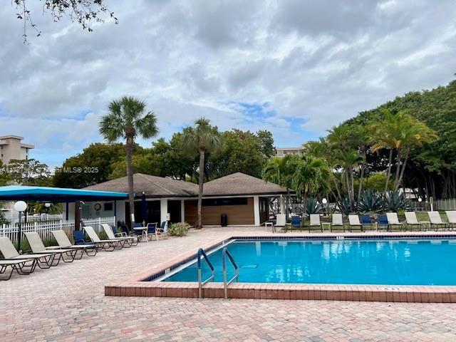 view of pool featuring a patio