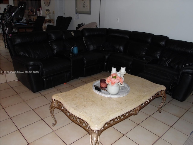 living room with light tile patterned floors