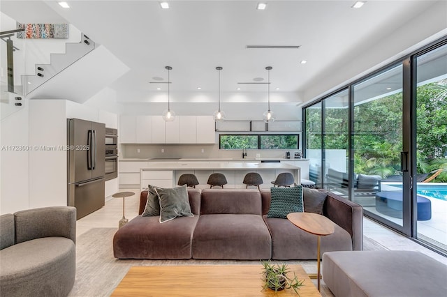 living room featuring sink