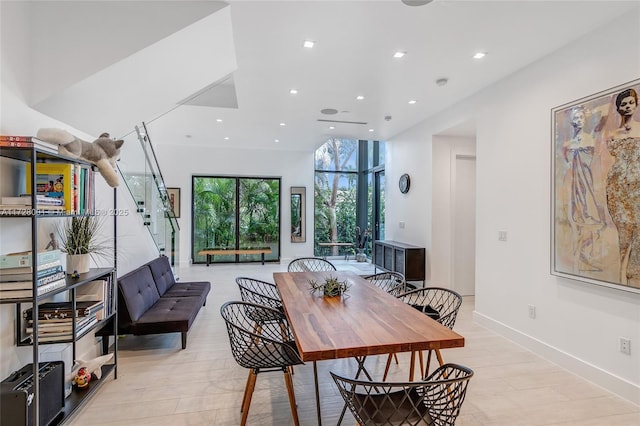 dining area with light hardwood / wood-style flooring