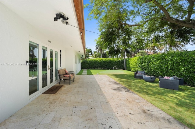 view of patio with an outdoor hangout area and french doors