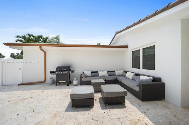 view of patio / terrace with an outdoor hangout area and a grill