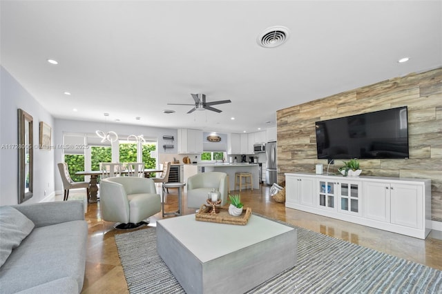 living room featuring ceiling fan