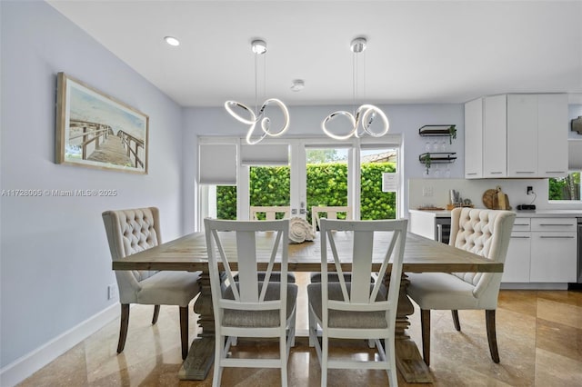 dining room featuring a chandelier