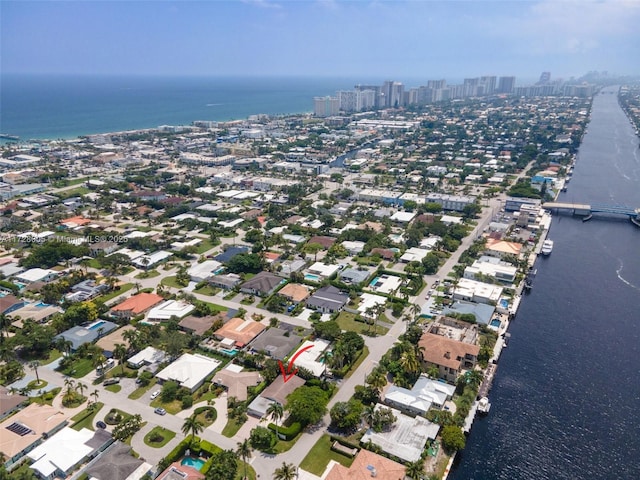 bird's eye view with a water view