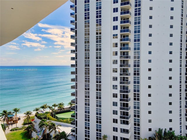 view of building exterior with a water view