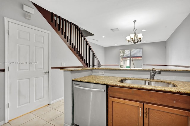 kitchen featuring stainless steel dishwasher, sink, hanging light fixtures, light tile patterned floors, and a chandelier