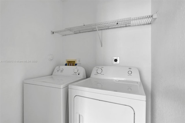 laundry area with washer and clothes dryer