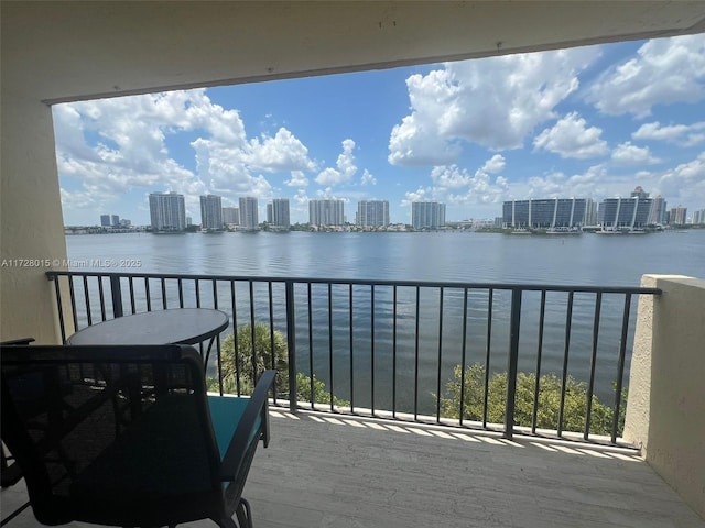 balcony featuring a water view