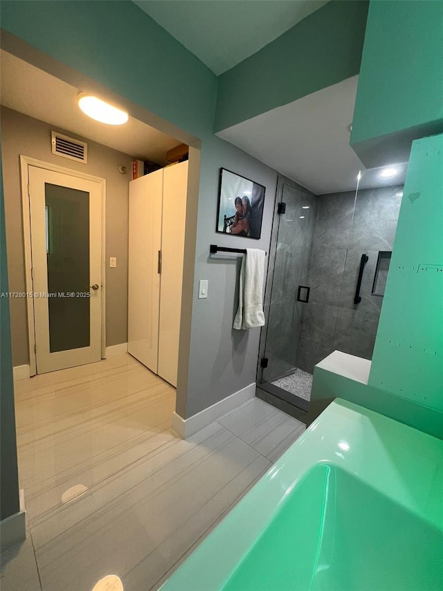 bathroom with walk in shower