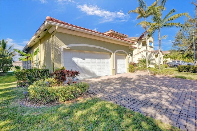 view of property exterior featuring a garage