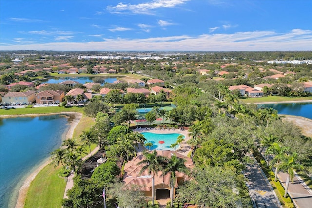 drone / aerial view with a water view