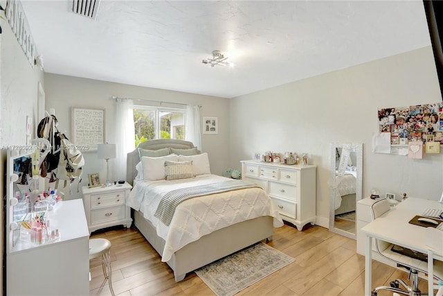 bedroom featuring light wood-type flooring