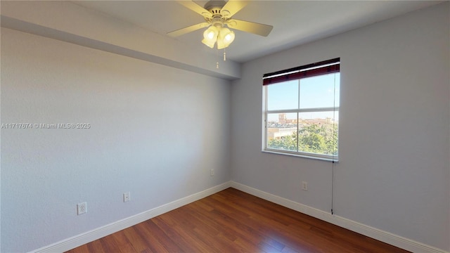 unfurnished room featuring ceiling fan and wood-type flooring