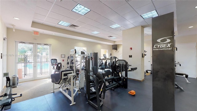 gym with a drop ceiling