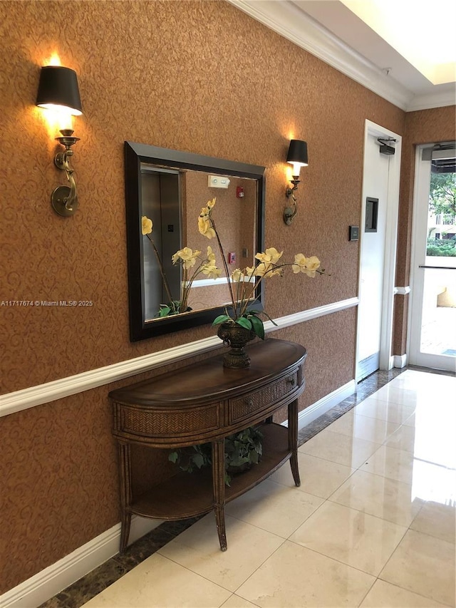 interior space featuring tile patterned floors and crown molding