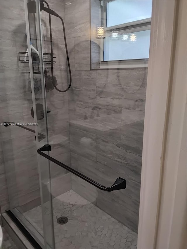 bathroom featuring a stall shower