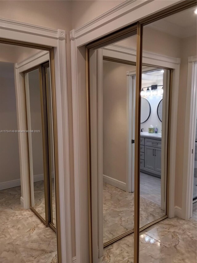 bathroom with toilet, vanity, and hardwood / wood-style flooring