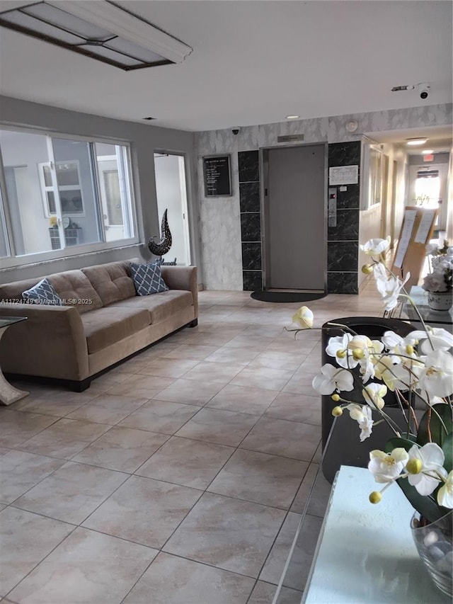 living room featuring light tile patterned flooring