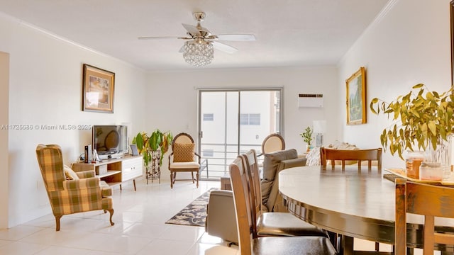 tiled dining space with ceiling fan and crown molding