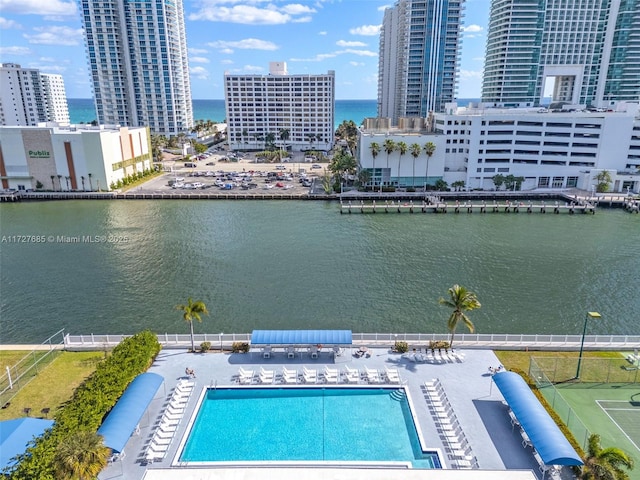 bird's eye view featuring a water view and a view of city