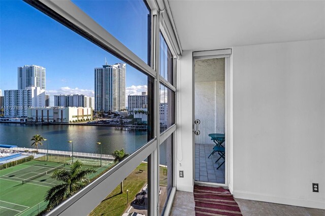 balcony featuring a water view