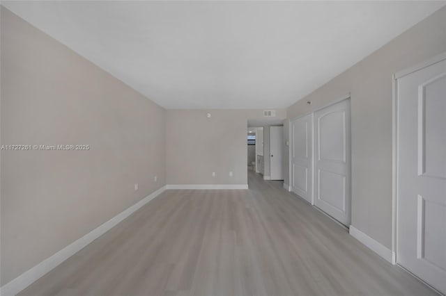 empty room featuring light hardwood / wood-style flooring