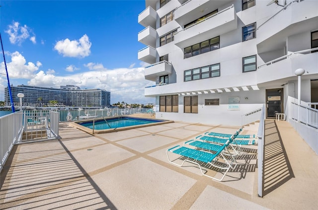 view of pool with a patio area