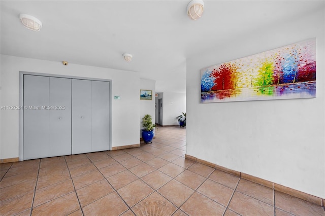 interior space featuring light tile patterned flooring