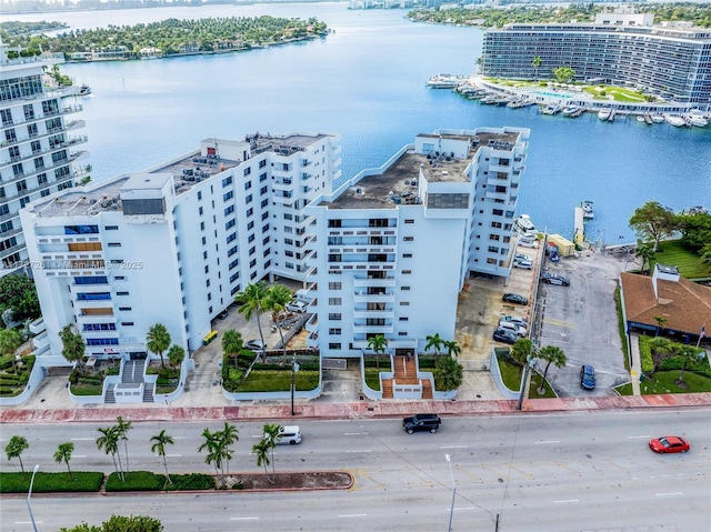 birds eye view of property featuring a water view