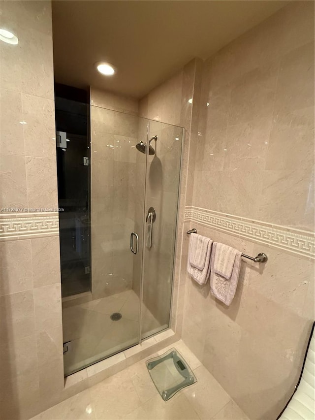 bathroom featuring tile patterned floors and walk in shower