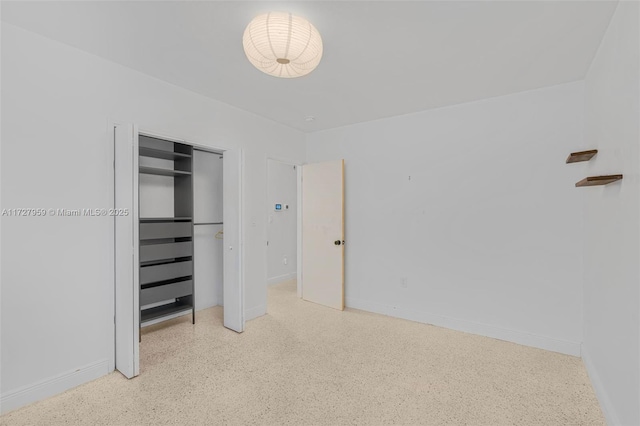 unfurnished bedroom with a closet