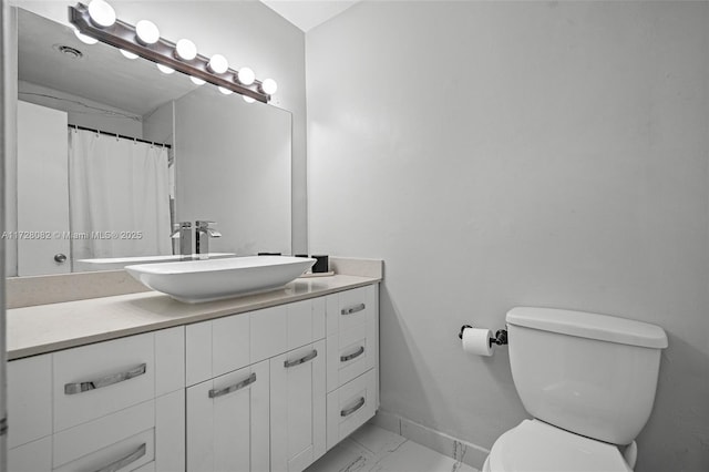1400 NE 191st St Unit 307, Miami, FL 33179 - full bath featuring marble finish floors, vanity, toilet, and baseboards