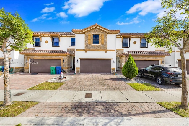 mediterranean / spanish-style house featuring a garage