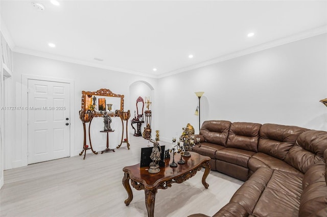 living room with ornamental molding