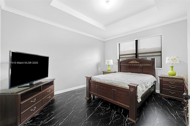 bedroom with ornamental molding and a tray ceiling