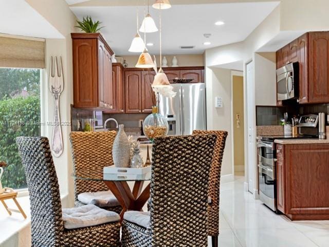 view of tiled dining space