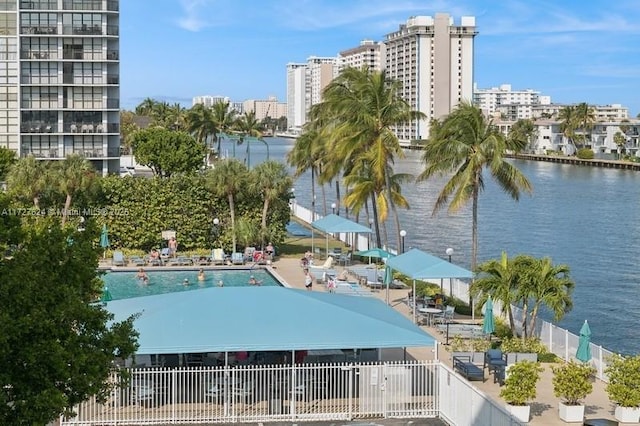 view of pool featuring a water view