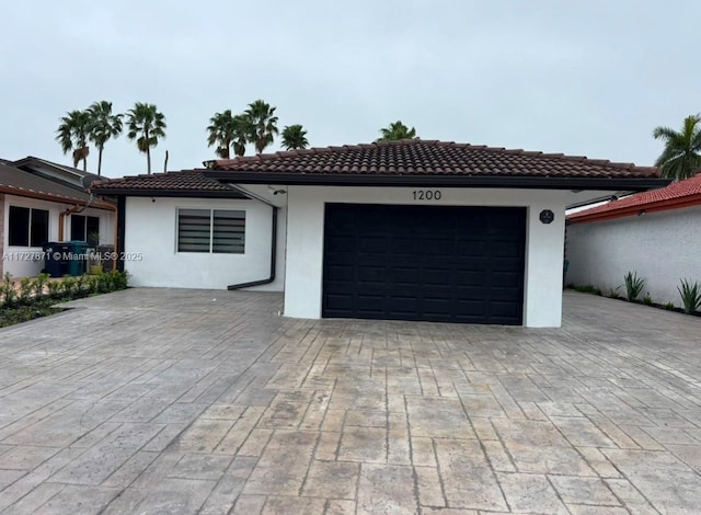 view of front of property featuring a garage