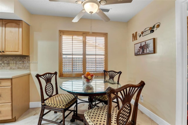 dining area featuring ceiling fan