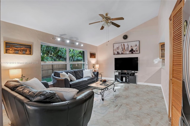 living room with high vaulted ceiling and ceiling fan