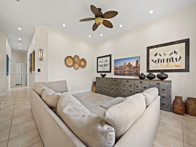 living room featuring ceiling fan and light tile patterned floors