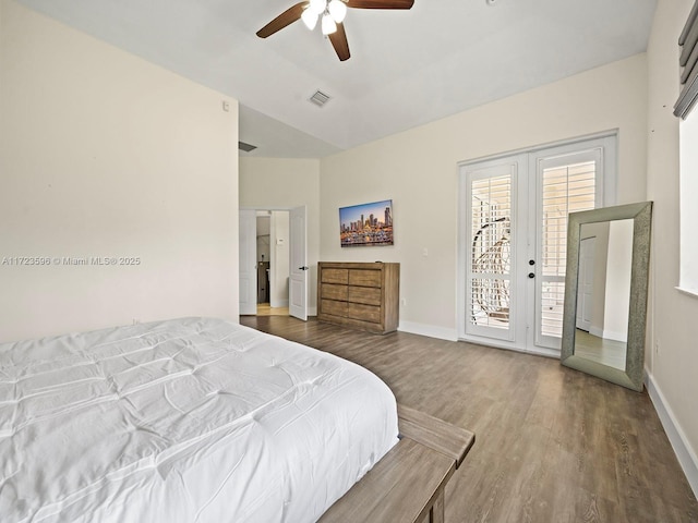 bedroom featuring ceiling fan, access to exterior, wood-type flooring, and french doors