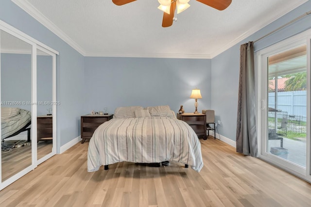 bedroom with ornamental molding, ceiling fan, access to exterior, and light hardwood / wood-style floors