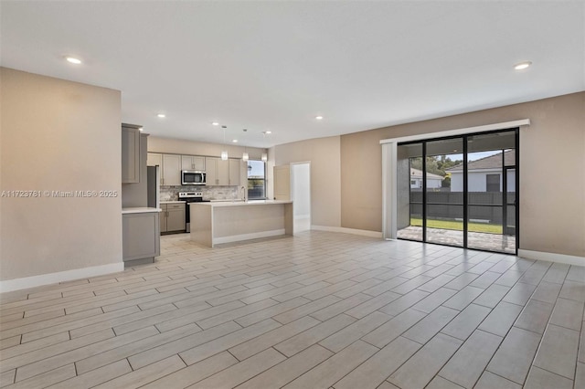 unfurnished living room with light hardwood / wood-style flooring